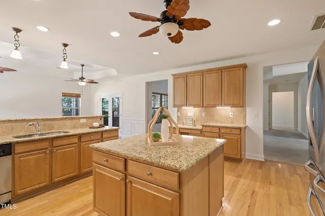 a view of a livingroom with a kitchen