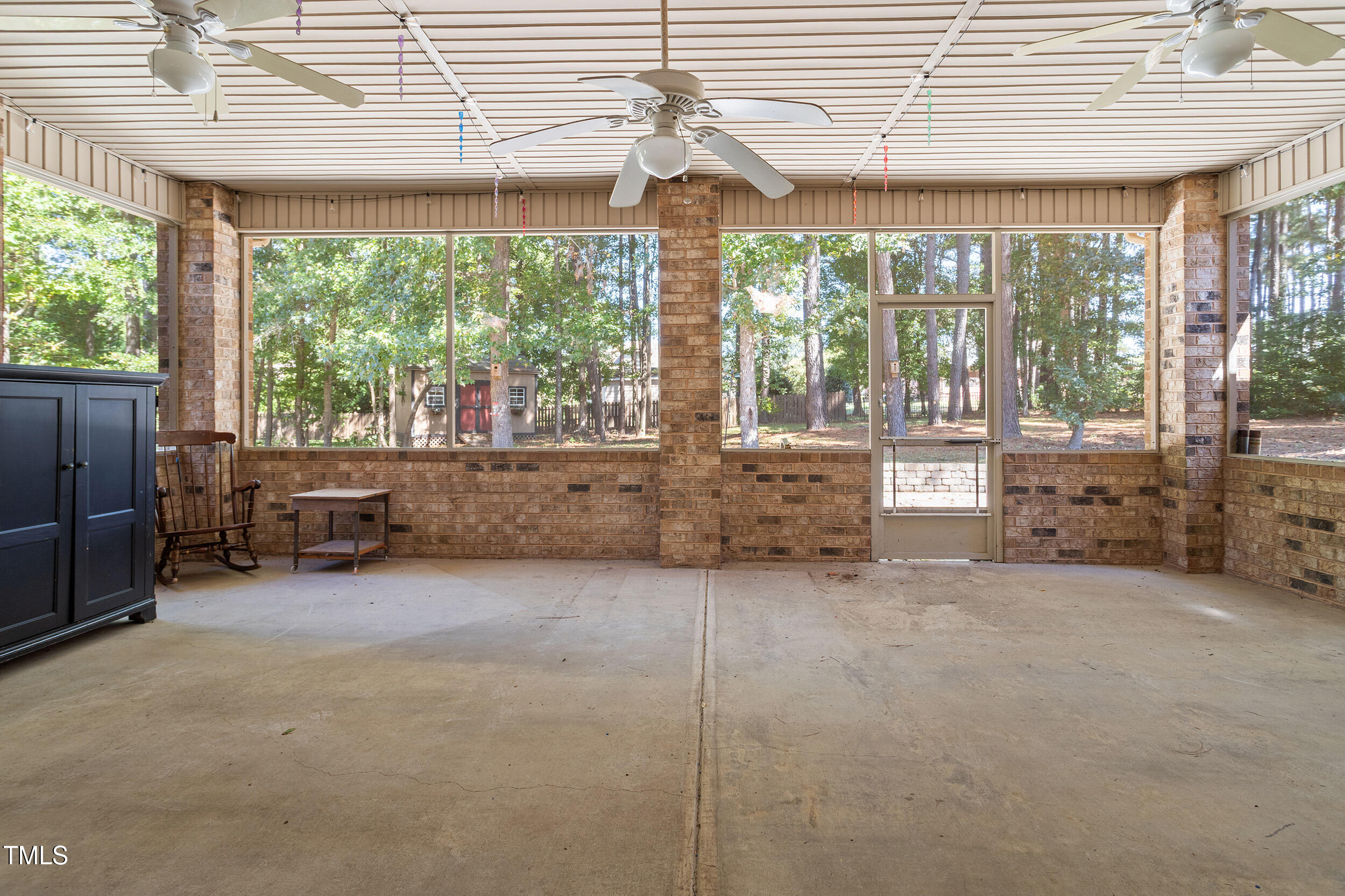 46 Spring Haven Lane Willow Spring, NC 27592 - Photo 23 of 45 a living room with furniture and a large window