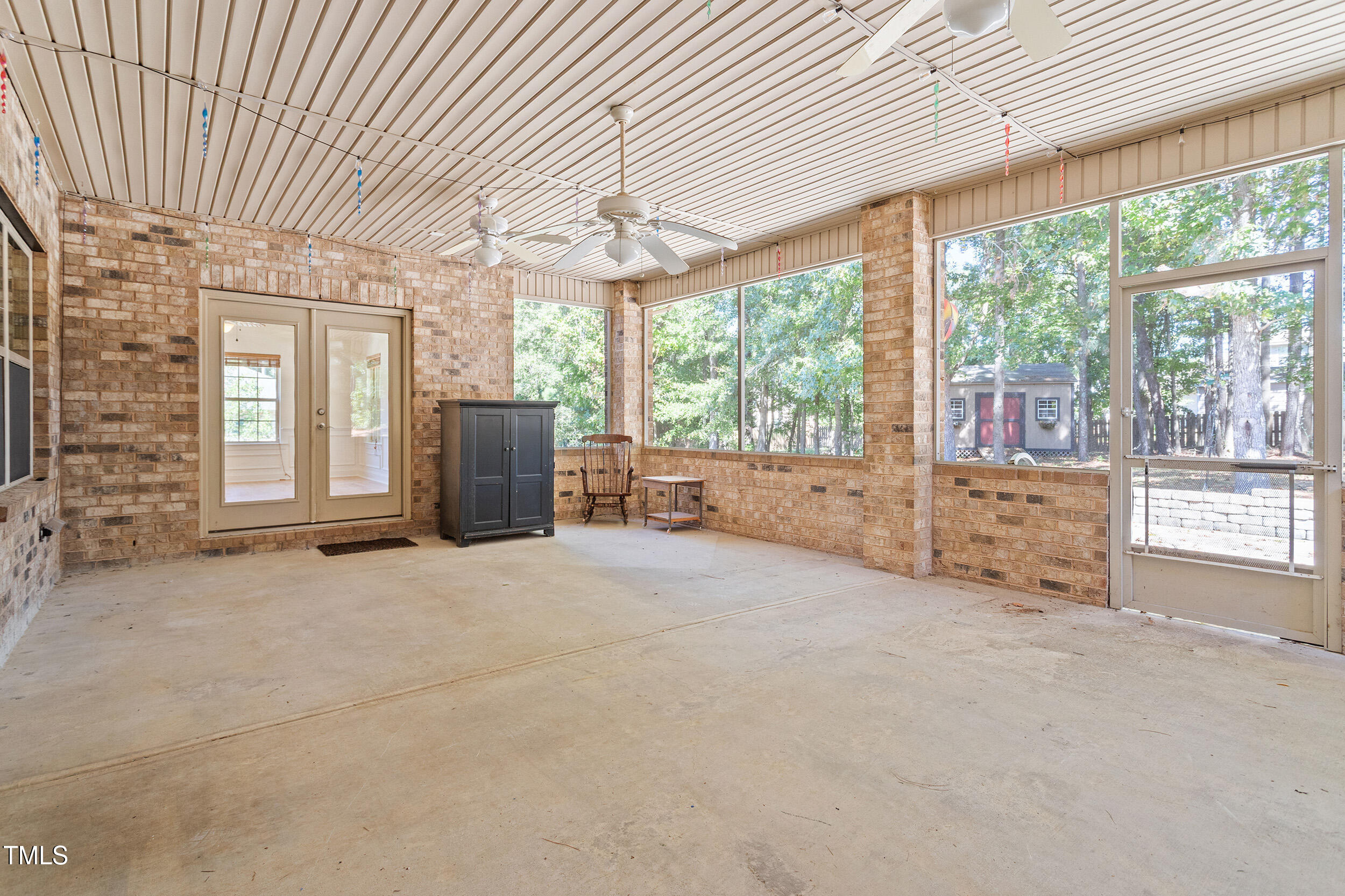 46 Spring Haven Lane Willow Spring, NC 27592 - Photo 24 of 45 an empty room with windows and view of an outdoor space