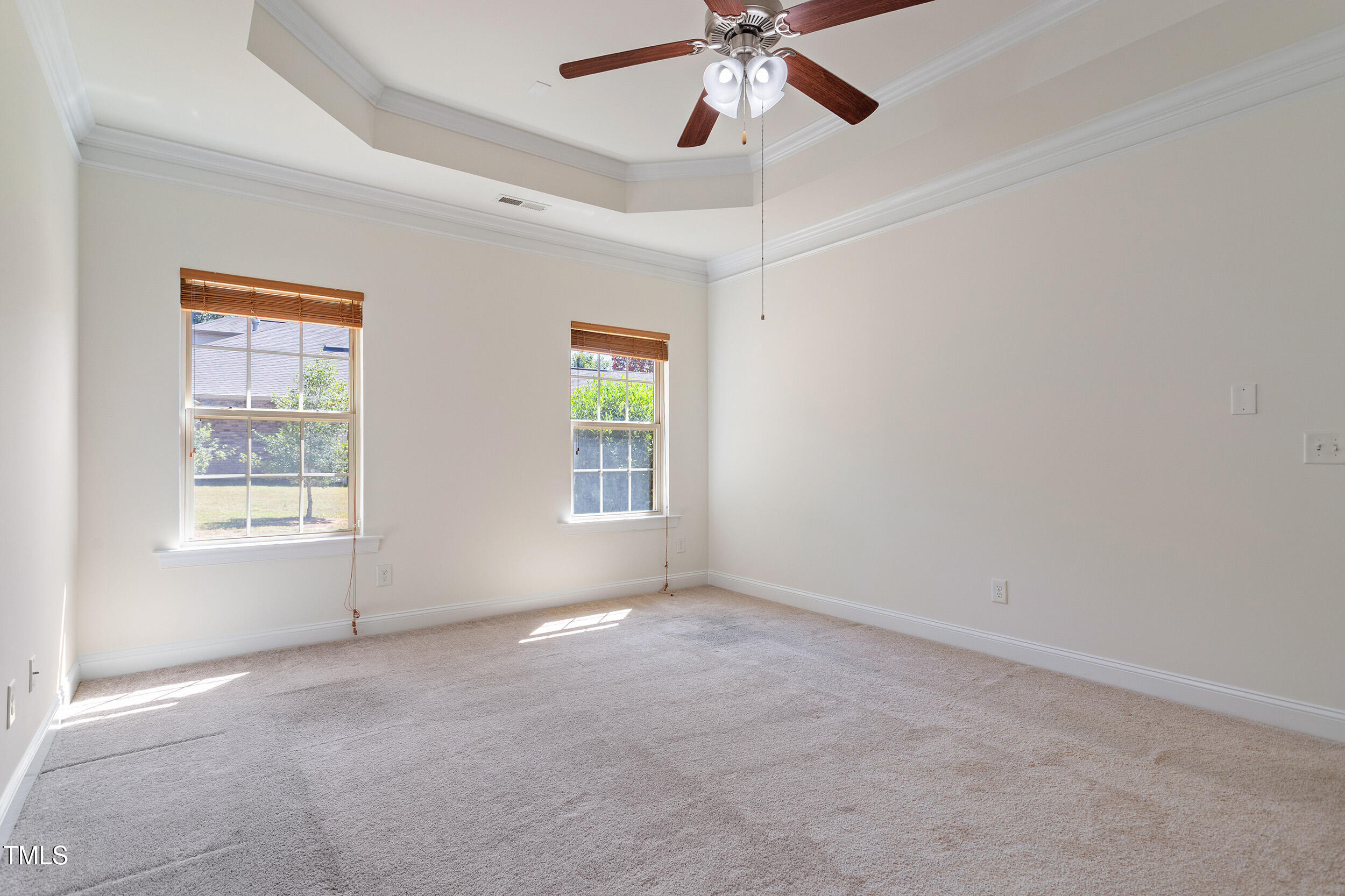 46 Spring Haven Lane Willow Spring, NC 27592 - Photo 25 of 45 an empty room with windows and fan