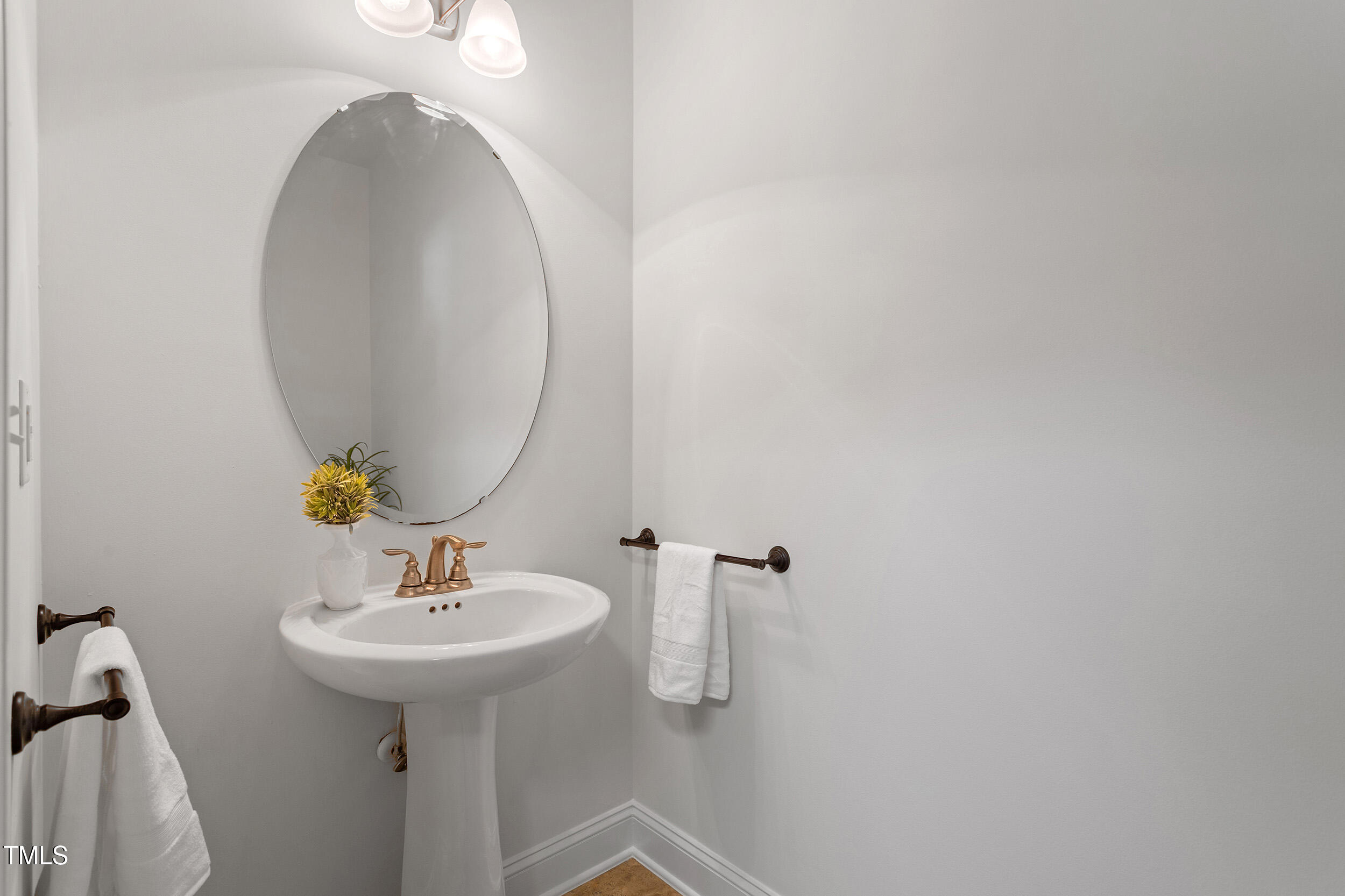 46 Spring Haven Lane Willow Spring, NC 27592 - Photo 37 of 45 a bathroom with a sink and mirror