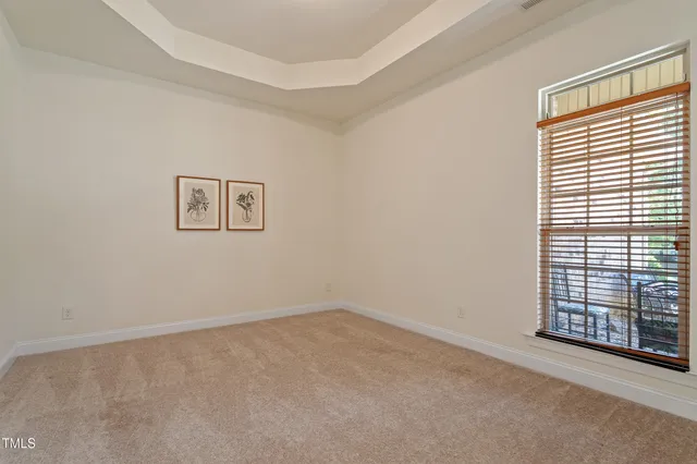 a view of livingroom with hardwood floor and a ceiling fan