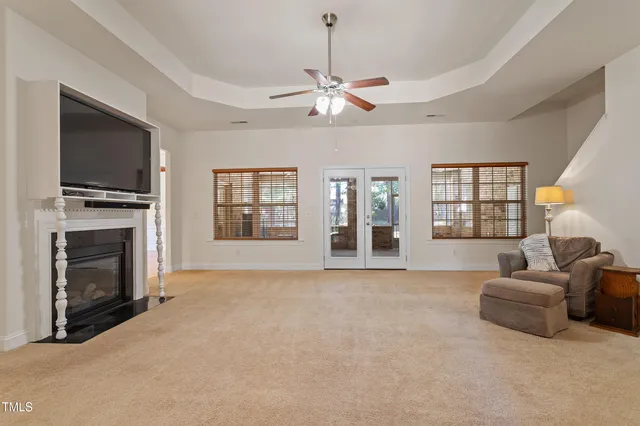 a large kitchen with stainless steel appliances granite countertop a sink and a stove