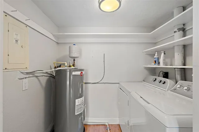 a utility room with dryer and washer