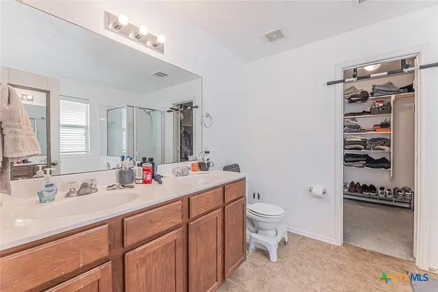 a white bath tub sitting next to a window