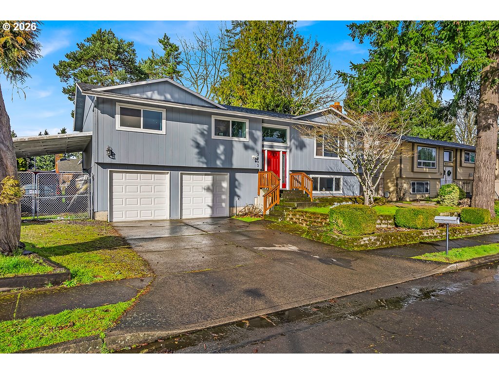 3893 Southwest 4th Street Gresham, OR 97030 - Photo 5 of 48 a front view of a house with garden