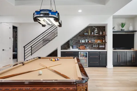 a room with furniture and flat screen tv