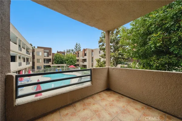 a view of an empty room with a fireplace