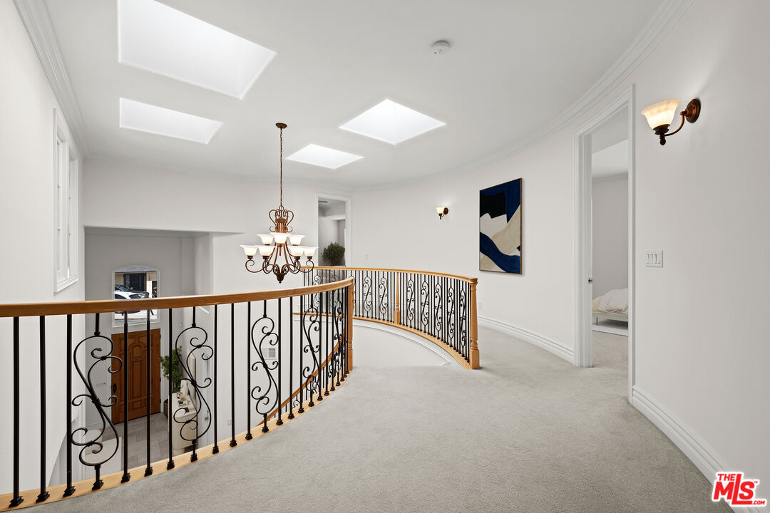 1756 Ruhland Avenue Manhattan Beach, CA 90266 - Photo 11 of 25 a view of a hallway with windows