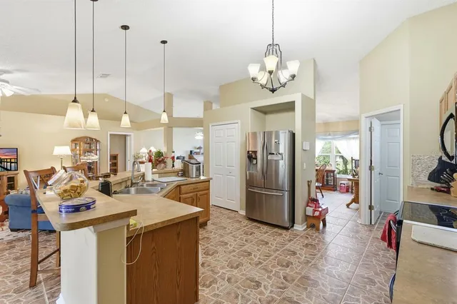a bedroom with a bed and a dresser in it
