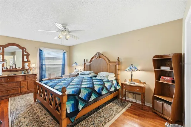 a view of a livingroom with furniture and a window