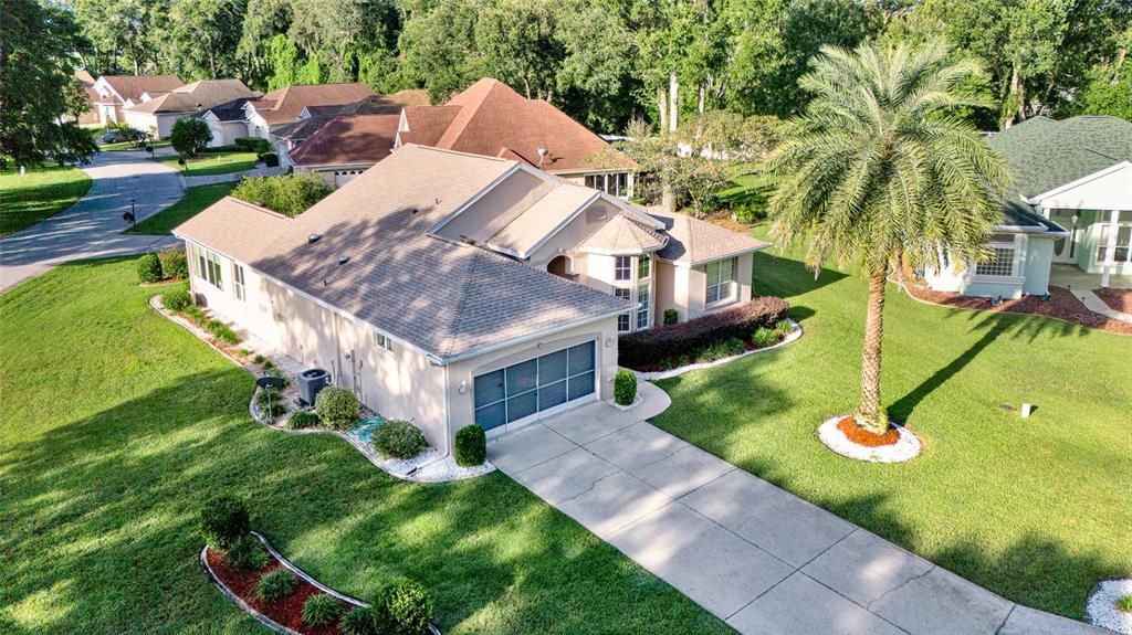 10777 Southwest 71st Circle Ocala, FL 34476 - Photo 43 of 47 an aerial view of a house with a garden