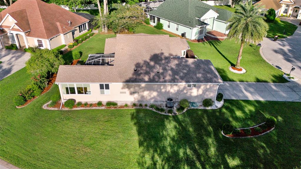 10777 Southwest 71st Circle Ocala, FL 34476 - Photo 44 of 47 an aerial view of residential houses with outdoor space and trees