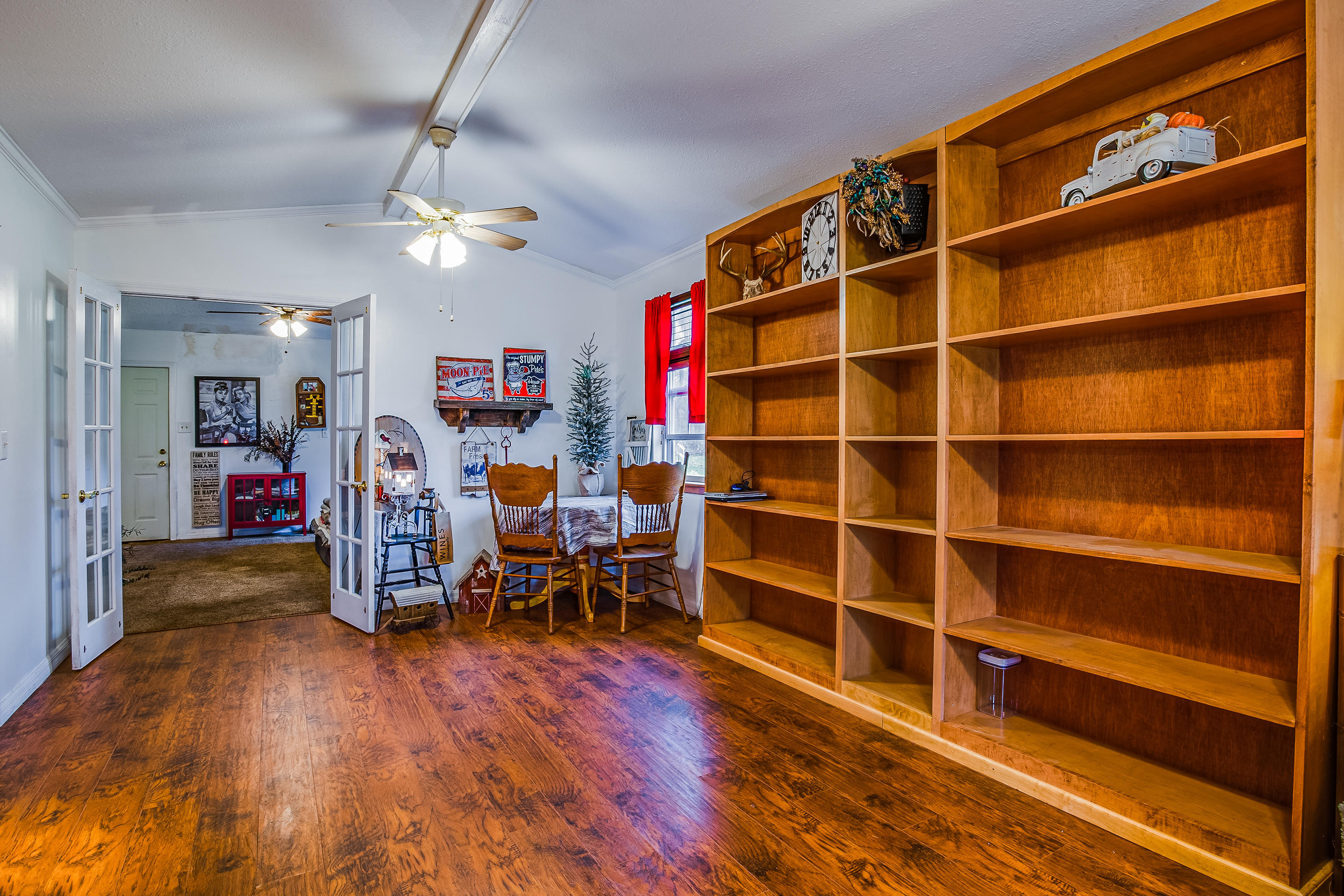56117 Griffin Road Callahan, FL 32011 - Photo 18 of 30 a view of a room with furniture and wooden floor