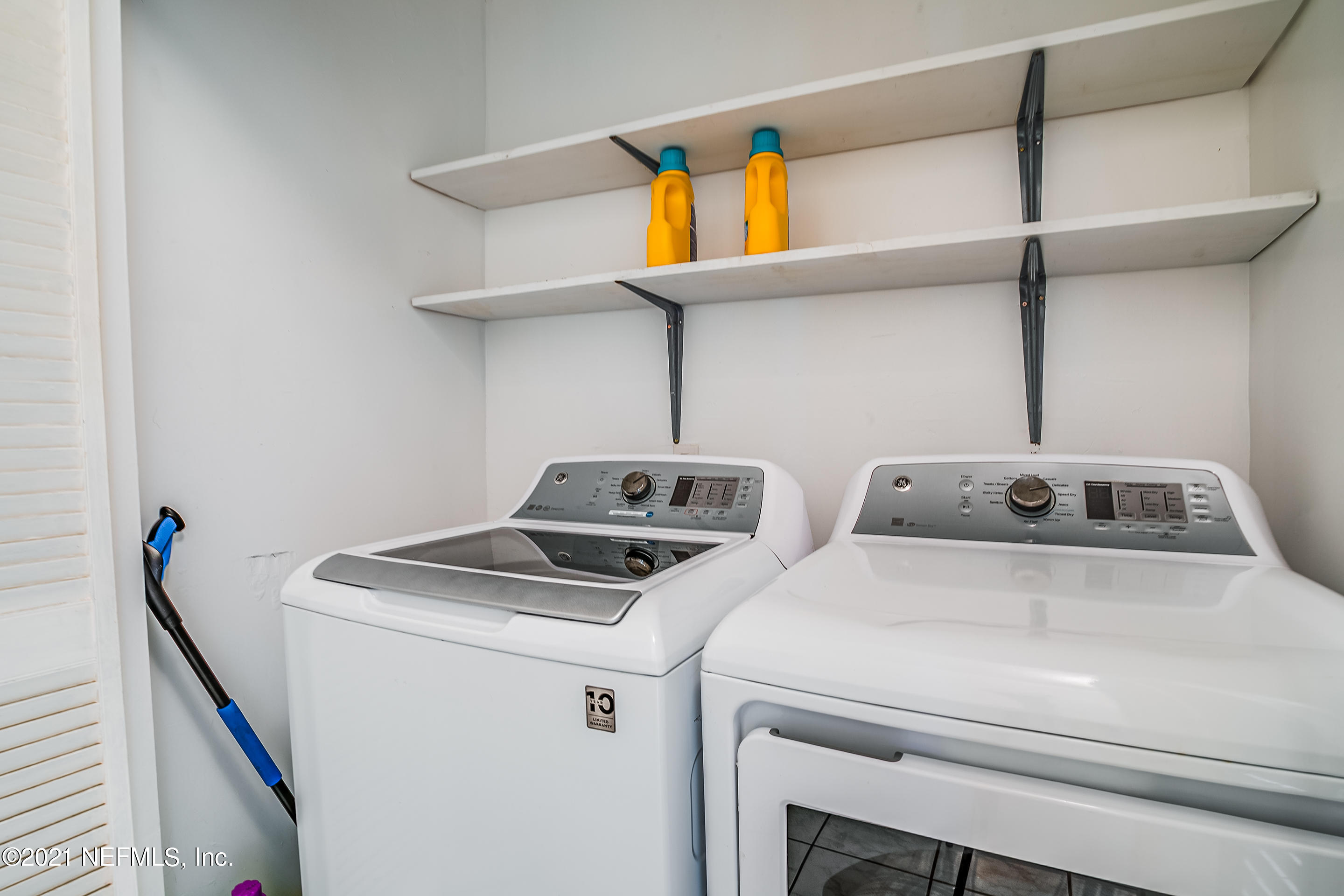 56117 Griffin Road Callahan, FL 32011 - Photo 25 of 30 a utility room with dryer and washer