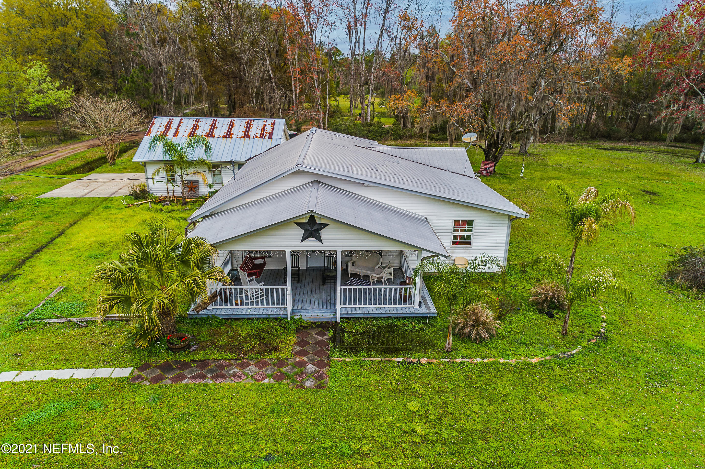 56117 Griffin Road Callahan, FL 32011 - Photo 3 of 30 a front view of a house with a yard