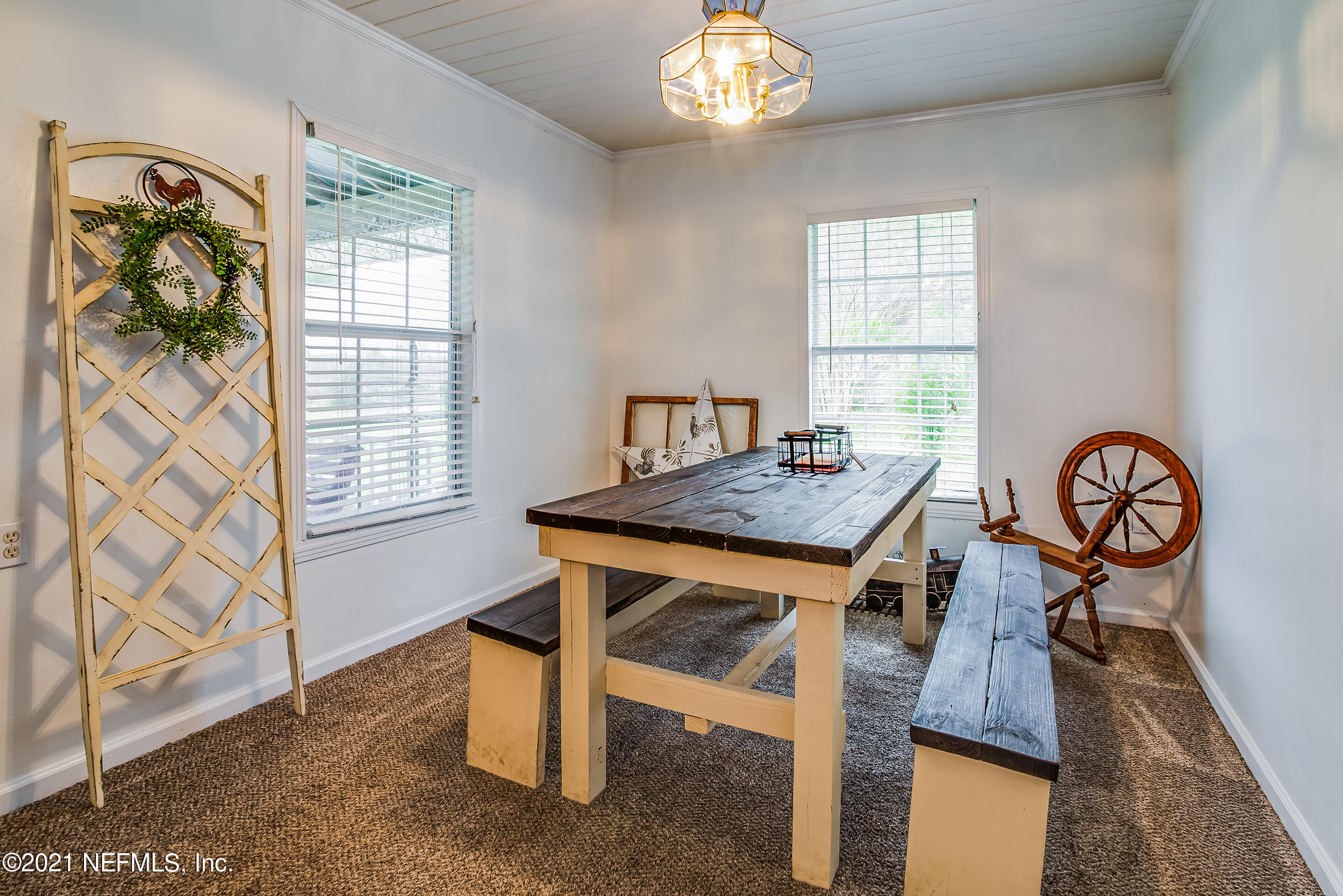 56117 Griffin Road Callahan, FL 32011 - Photo 10 of 30 a view of a dining room with furniture window and outside view