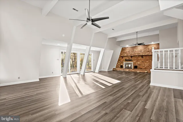 a view of a livingroom with wooden floor