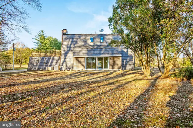 a view of a house with a ocean view
