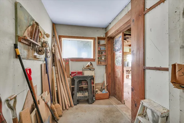 a view of a livingroom with furniture and a flat screen tv