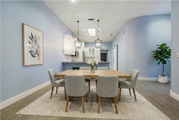 a view of a dining room with furniture