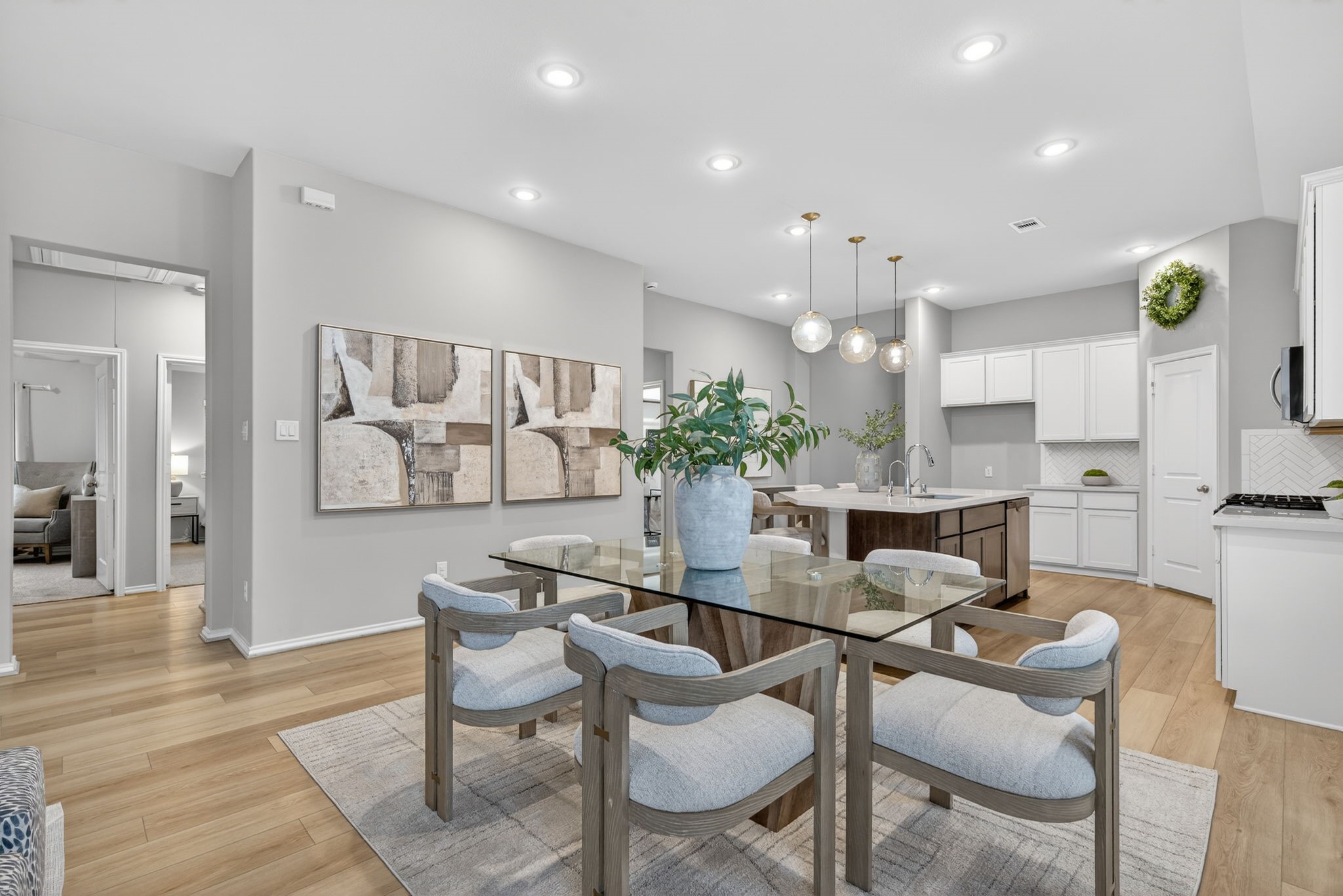 31731 Redbud Blossom Lane Spring, TX 77386 - Photo 14 of 38 Another view of the dining room looking toward the kitchen. The layout is bright and inviting, perfect for entertaining.