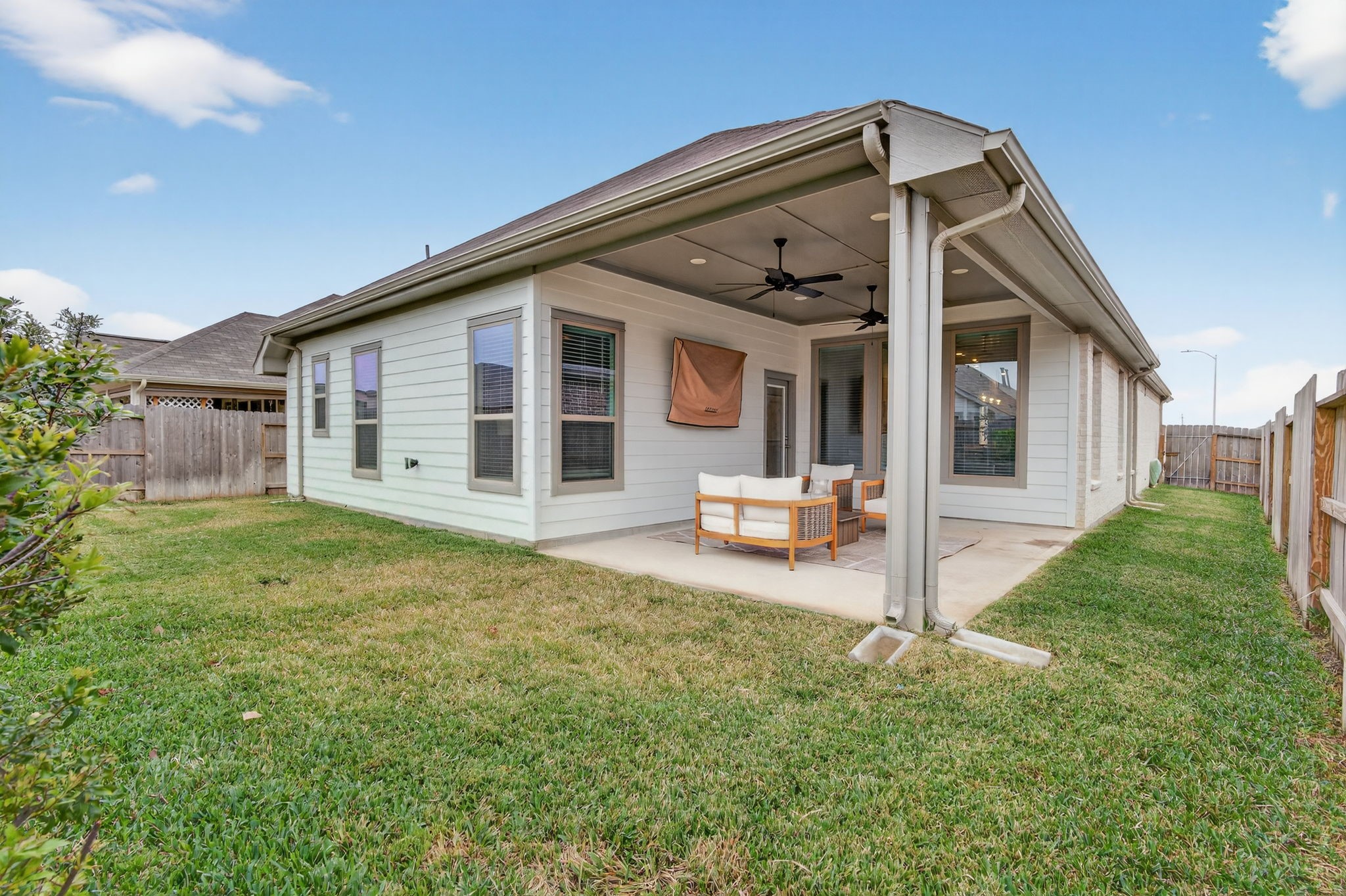 31731 Redbud Blossom Lane Spring, TX 77386 - Photo 32 of 38 Another view of the back patio showing how large it is.
