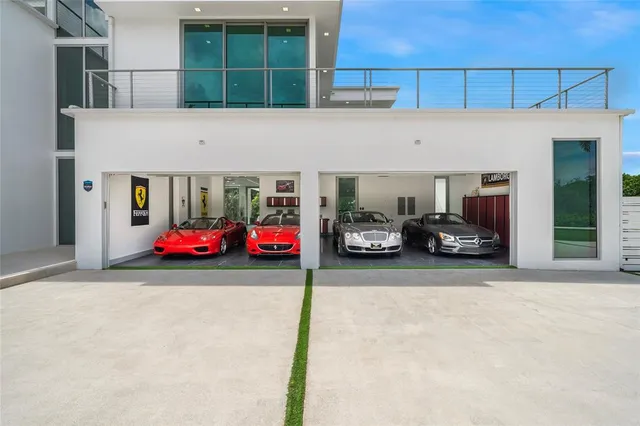 a view of a livingroom with furniture and a kitchen