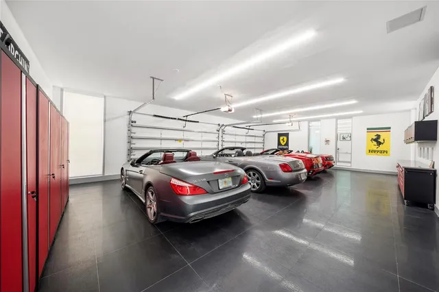 a dining room with furniture and a floor to ceiling window