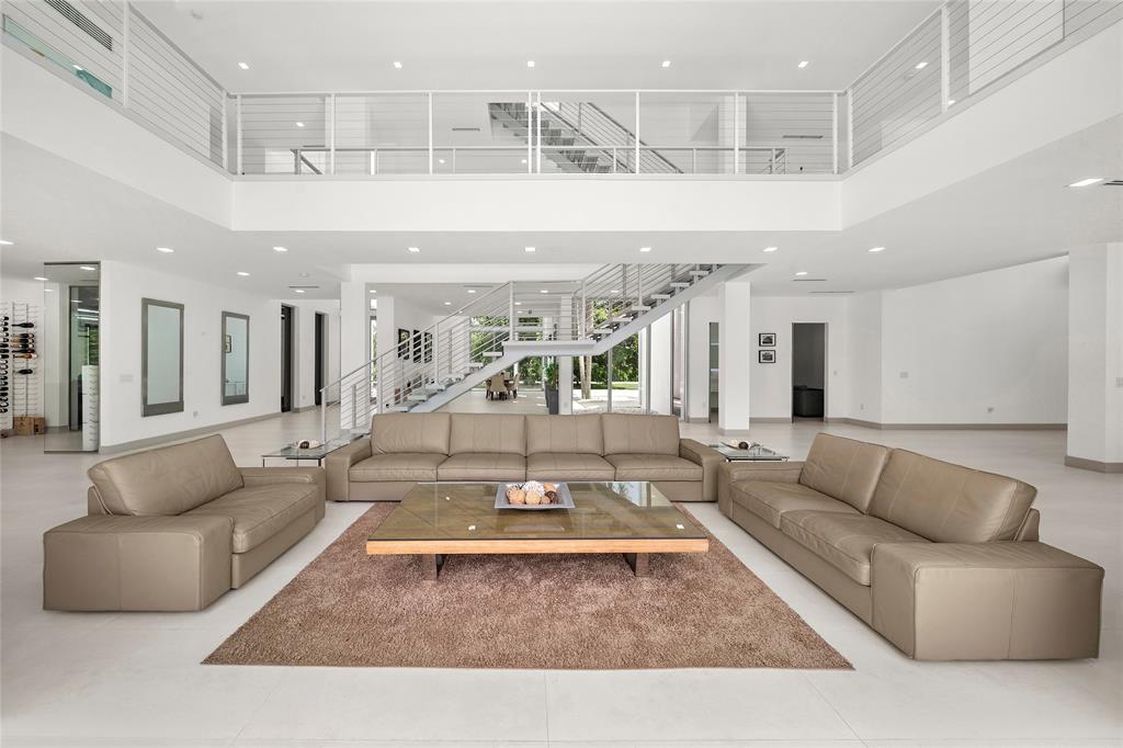 17250 Southwest 52nd Court Southwest Ranches, FL 33331 - Photo 24 of 62 a living room with furniture and a large window