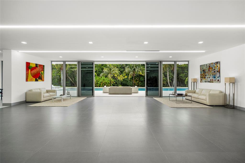 17250 Southwest 52nd Court Southwest Ranches, FL 33331 - Photo 29 of 62 a view of an empty room with wooden floor and windows