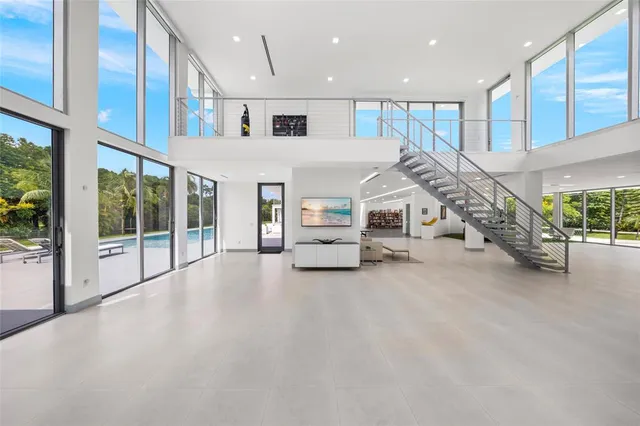 a kitchen with a sink and refrigerator