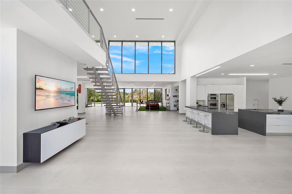 17250 Southwest 52nd Court Southwest Ranches, FL 33331 - Photo 35 of 62 a living room with furniture and a flat screen tv