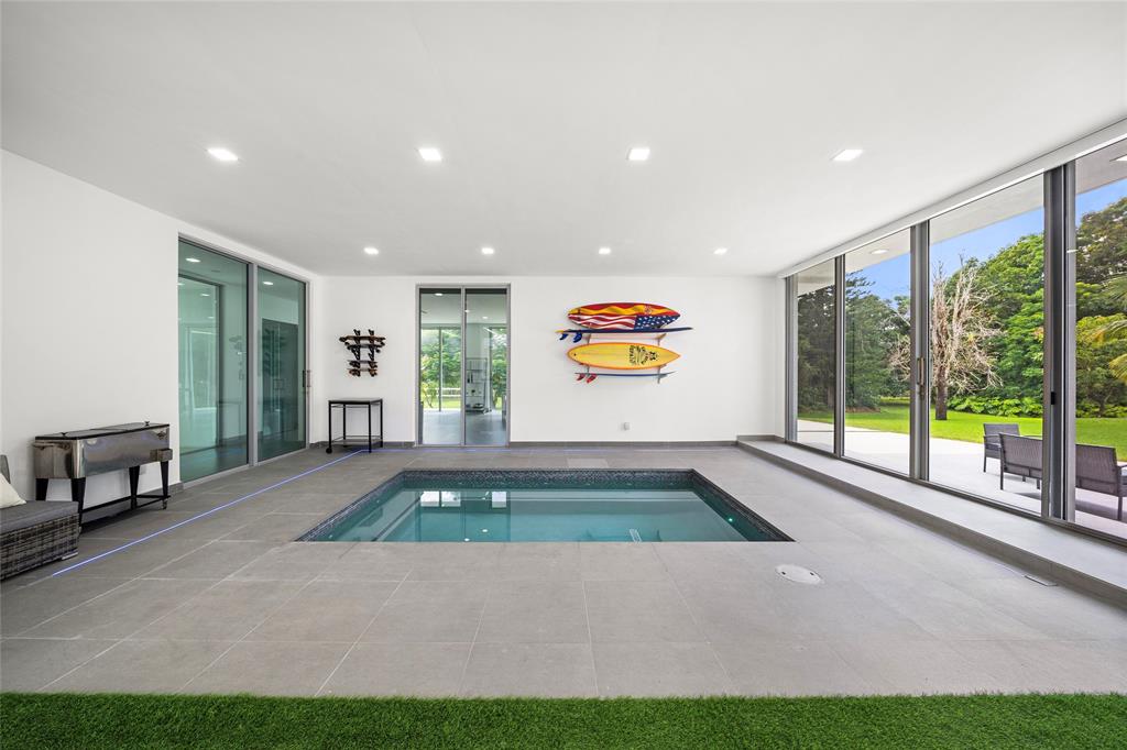 17250 Southwest 52nd Court Southwest Ranches, FL 33331 - Photo 38 of 62 a room with table tennis air hockey table and arcade game machine