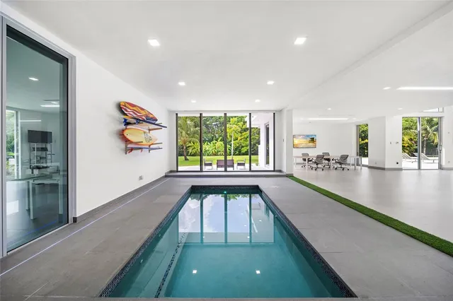 a view of walk in closet with clothes