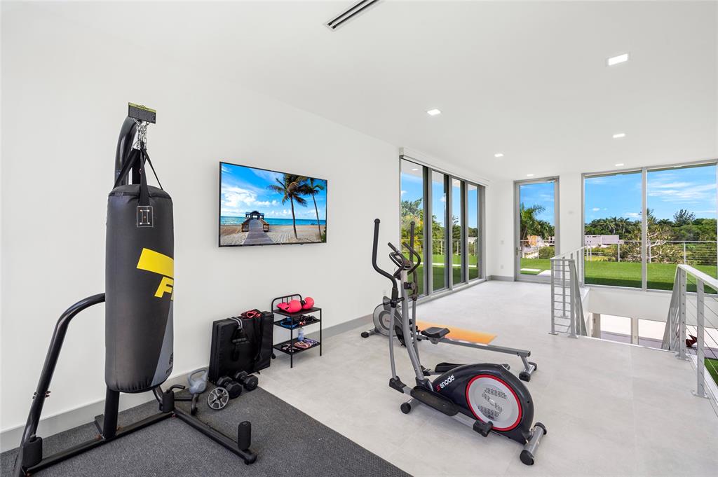 17250 Southwest 52nd Court Southwest Ranches, FL 33331 - Photo 40 of 62 a view of a room with gym equipment