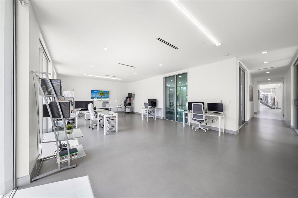 17250 Southwest 52nd Court Southwest Ranches, FL 33331 - Photo 41 of 62 a room with lots of furniture and view of kitchen