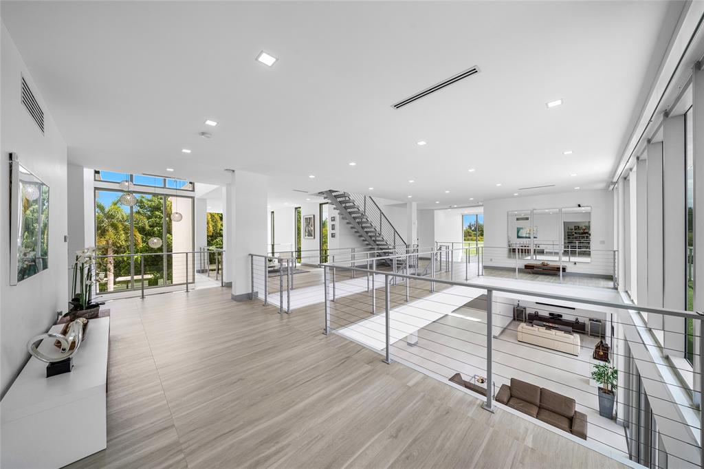 17250 Southwest 52nd Court Southwest Ranches, FL 33331 - Photo 44 of 62 a view of kitchen with furniture and wooden floor
