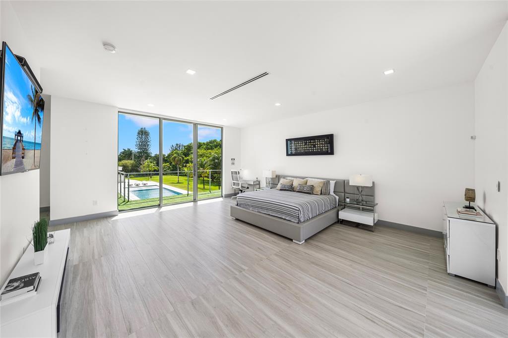 17250 Southwest 52nd Court Southwest Ranches, FL 33331 - Photo 46 of 62 a living room with furniture and a large window