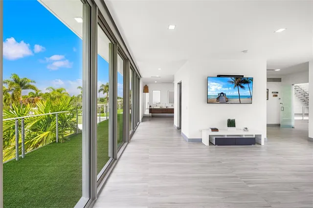 a view of house with a big yard