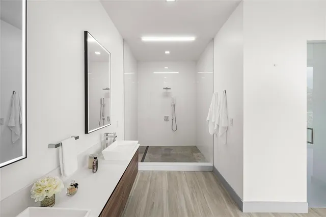 a view of a living room and a wooden floor