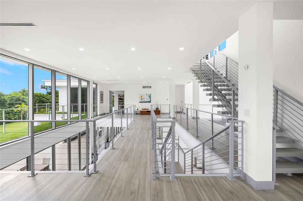 17250 Southwest 52nd Court Southwest Ranches, FL 33331 - Photo 58 of 62 a view of a living room and a wooden floor