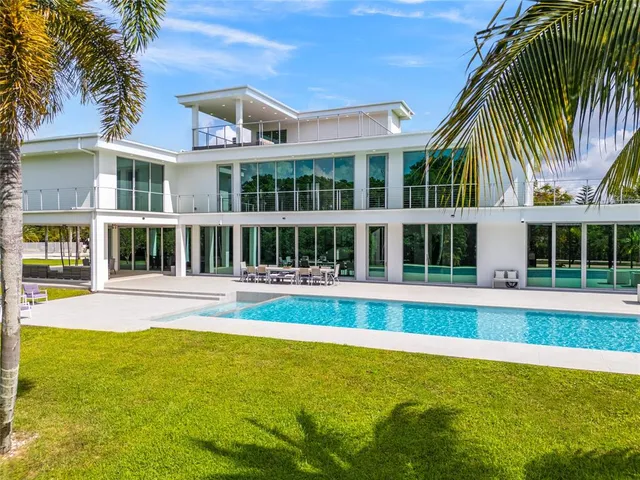 a front view of a house with a garage
