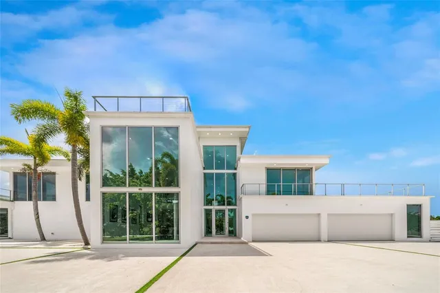 a bedroom with bed and window