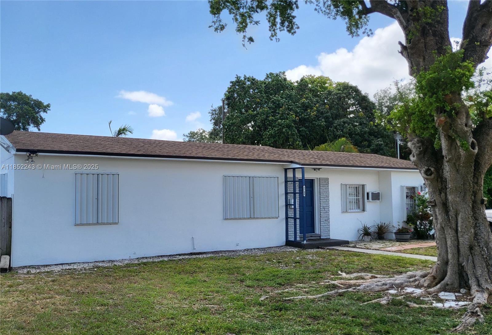 5740 Southwest 60th Street Miami, FL 33143 - Photo 1 of 7 a view of outdoor space yard and garage