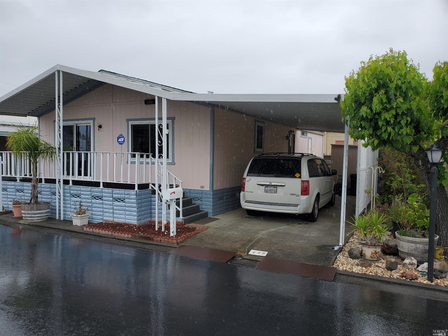 a car parked in front of a house