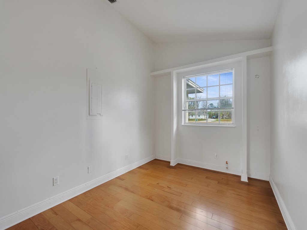 167 Deer Run Road Palm Bay, FL 32909 - Photo 18 of 35 a view of an empty room with a window