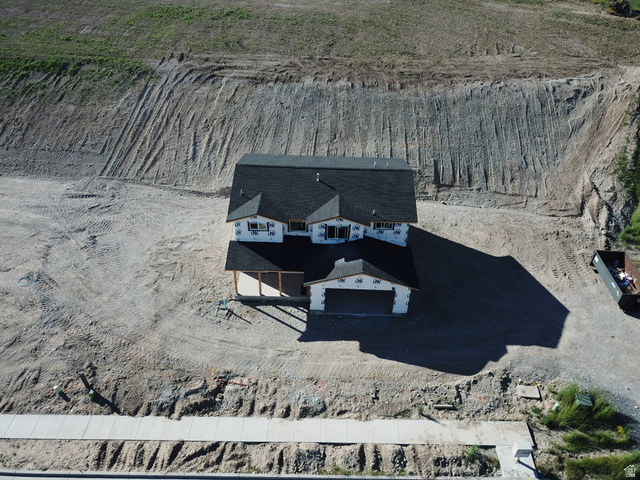513 East Upper Cyn Road Smithfield, UT 84335 - Photo 8 of 25 Two-story residence featuring a dark shingle roof and a two-car garage