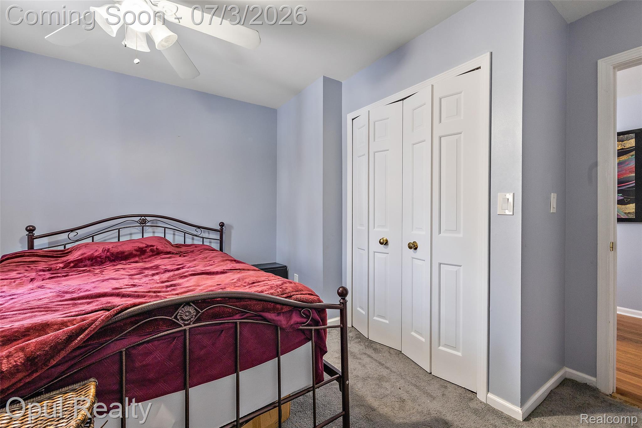 8855 Gross Road Dexter, MI 48130 - Photo 45 of 53 Recessed lighting, ceiling fan, bi-fold closet doors, and light gray wall paint