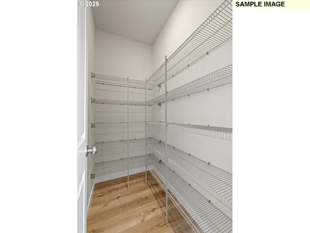 a bathroom with a granite countertop sink mirror and double